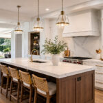 Bright functional kitchen remodel with white cabinetry and wood island