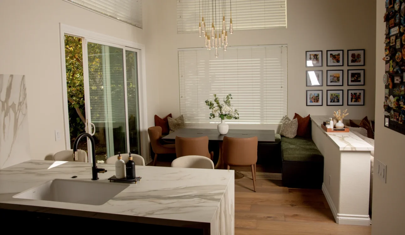 Open kitchen and dining area with connected living spaces