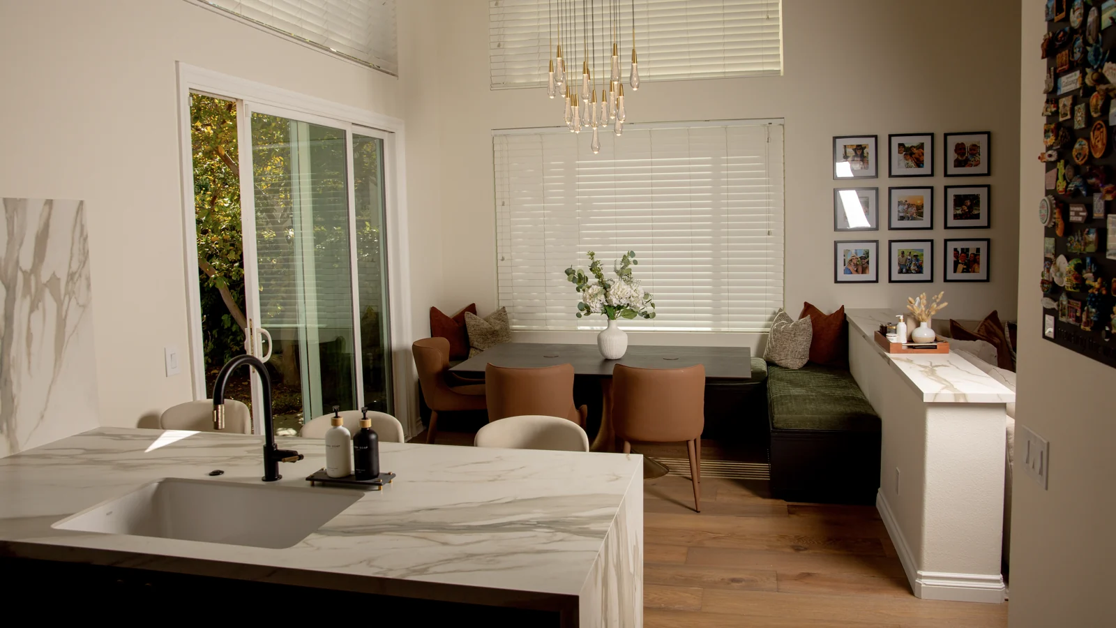 Open kitchen and dining area with connected living spaces
