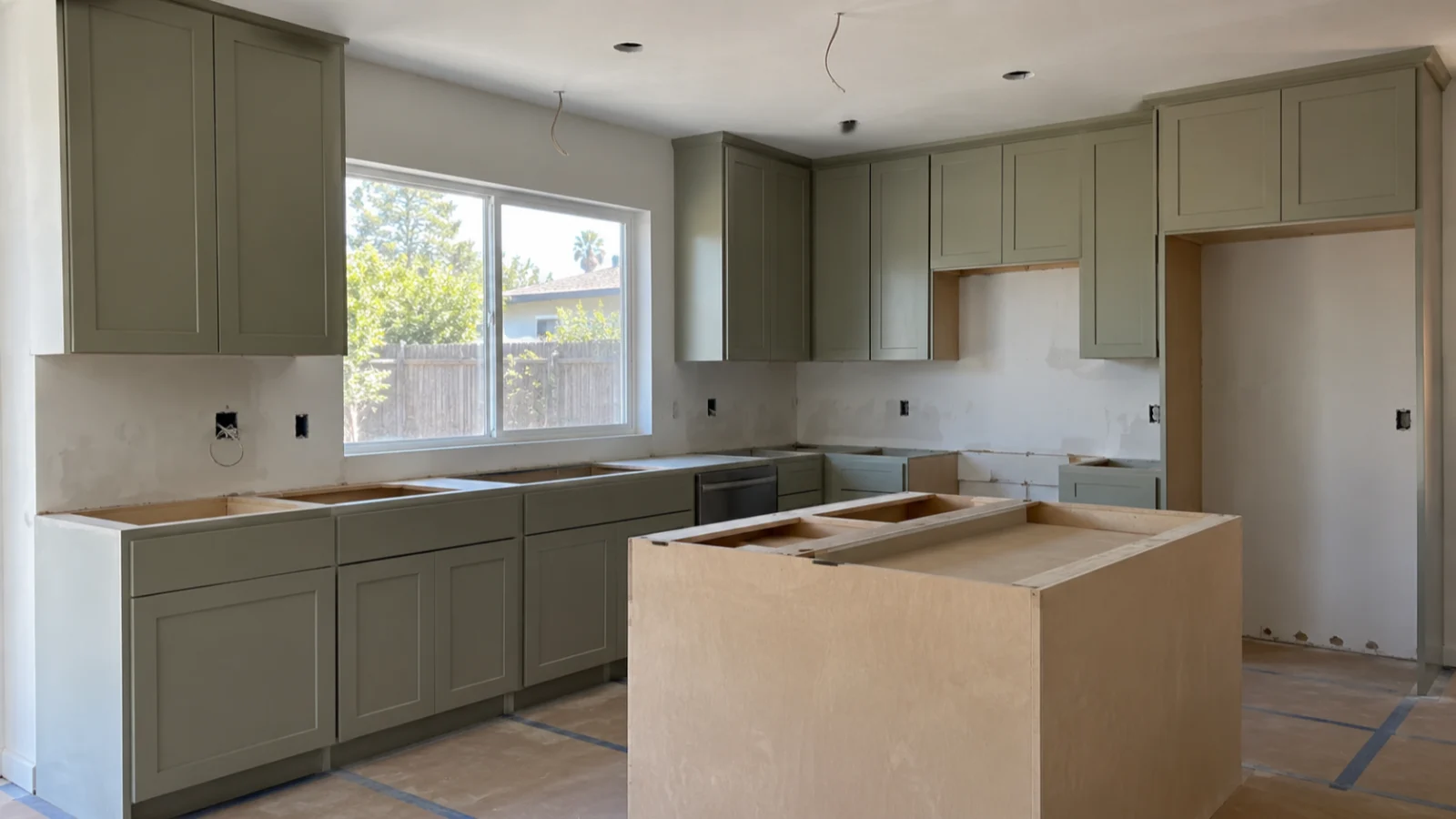 Orange County kitchen remodel during cabinet installation