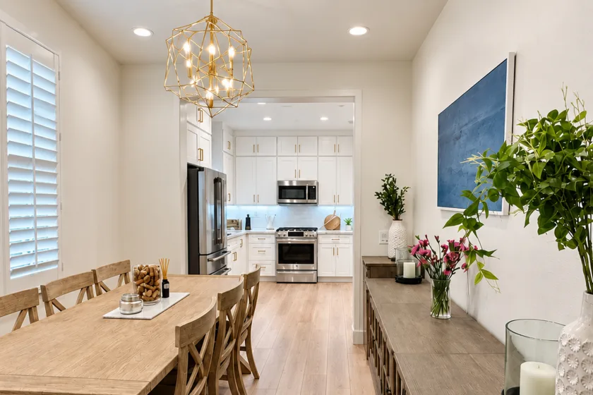 Connected dining and kitchen spaces in a remodeled home